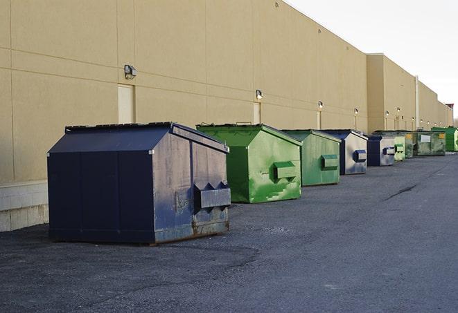 several large trash cans setup for proper construction site cleanup in Farmingville, NY